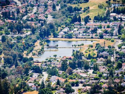 Aerial view of Dr Robert Gross Groundwater Recharge Pond surrounded by a residential neighborhood - San Jose - South San Francisco bay area_by Sundry Photography